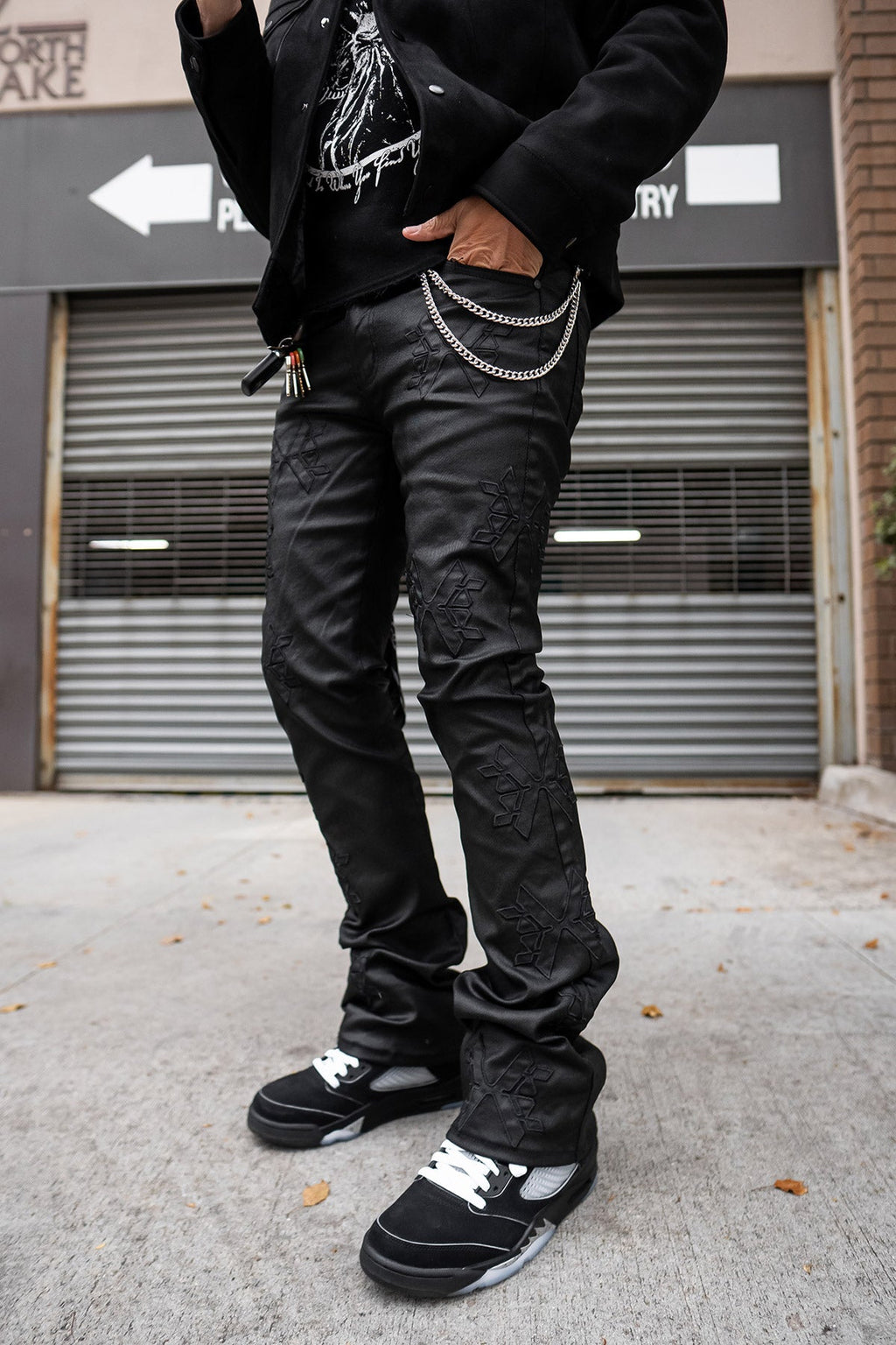 MONOGRAM WAXED FLARED PANTS