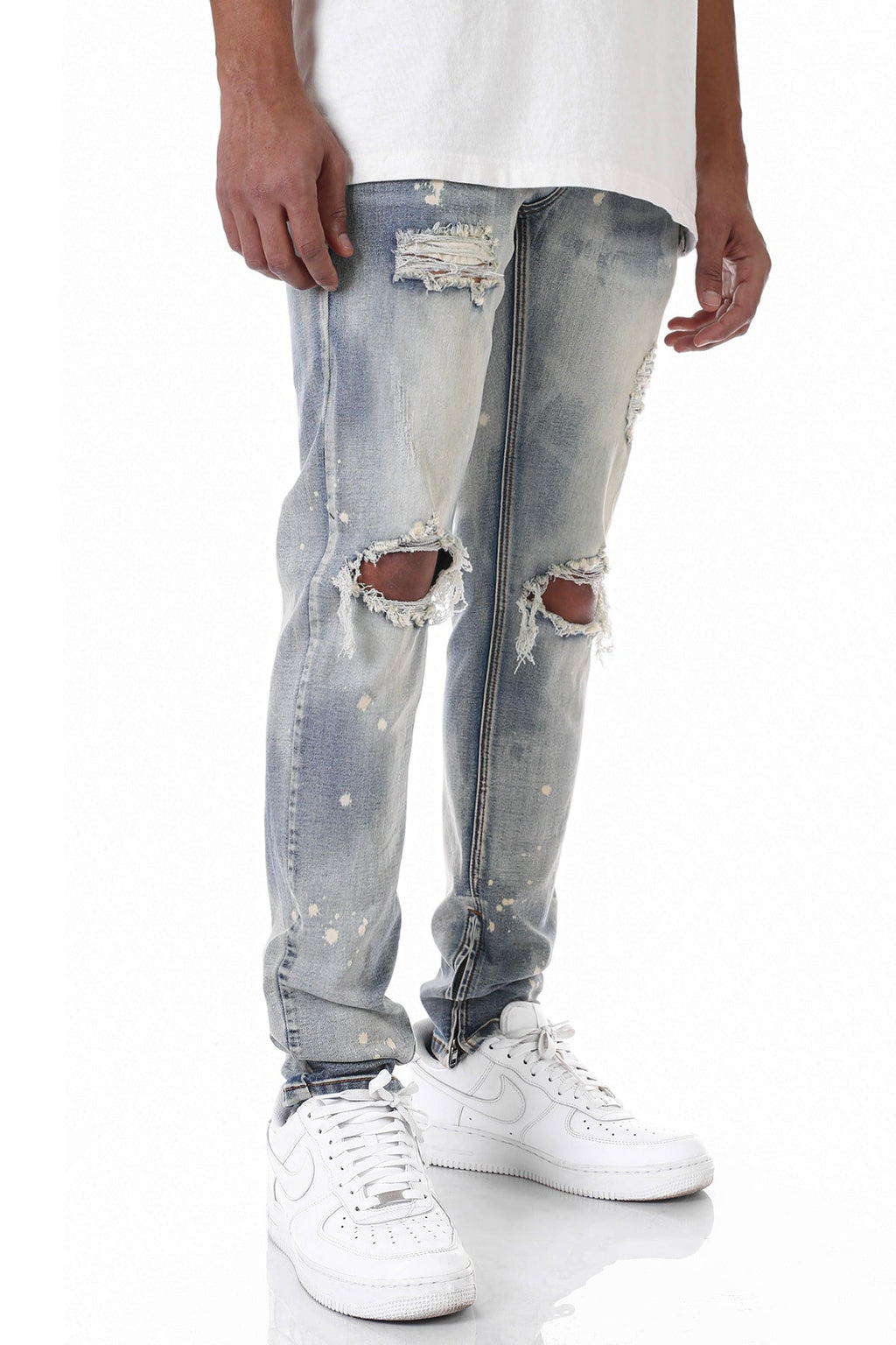 BLEACHED ANKLE ZIP JEANS WITH BLEACH SPOTS